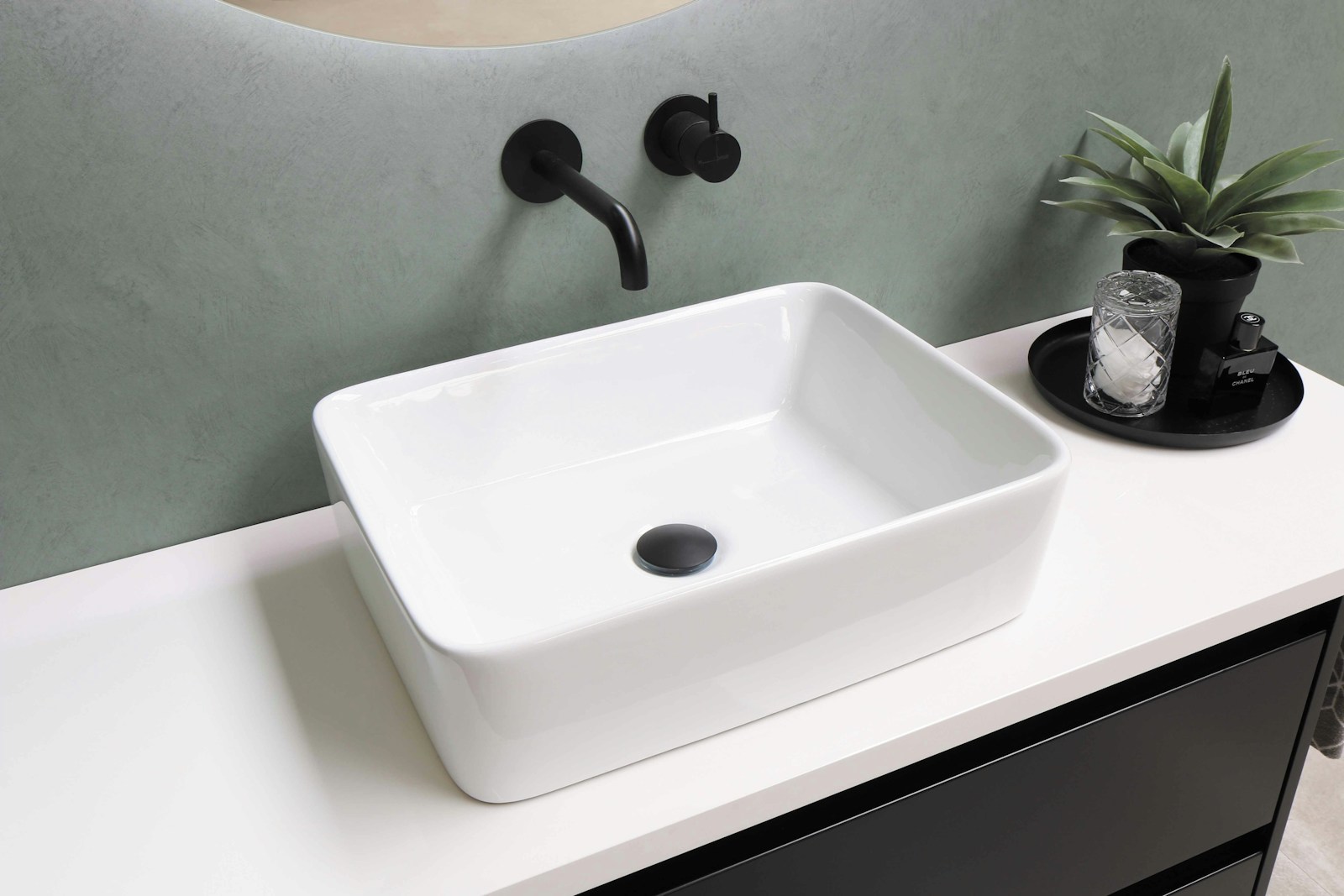 white ceramic sink with stainless steel faucet